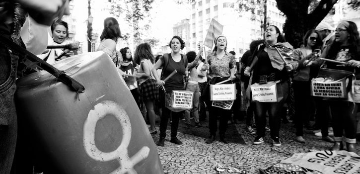 São Paulo, Brazil - May 28, 2016: Women play drums in action for the rights of gay women and the end of the coup d'etat in the country